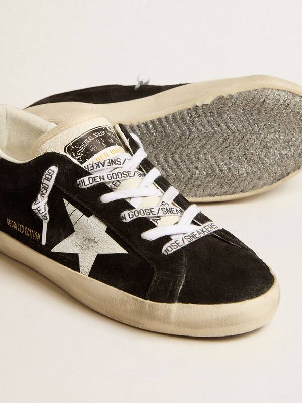Golden Goose - Women's Super-Star LTD in black suede with white printed star and silver glitter heel tab in 