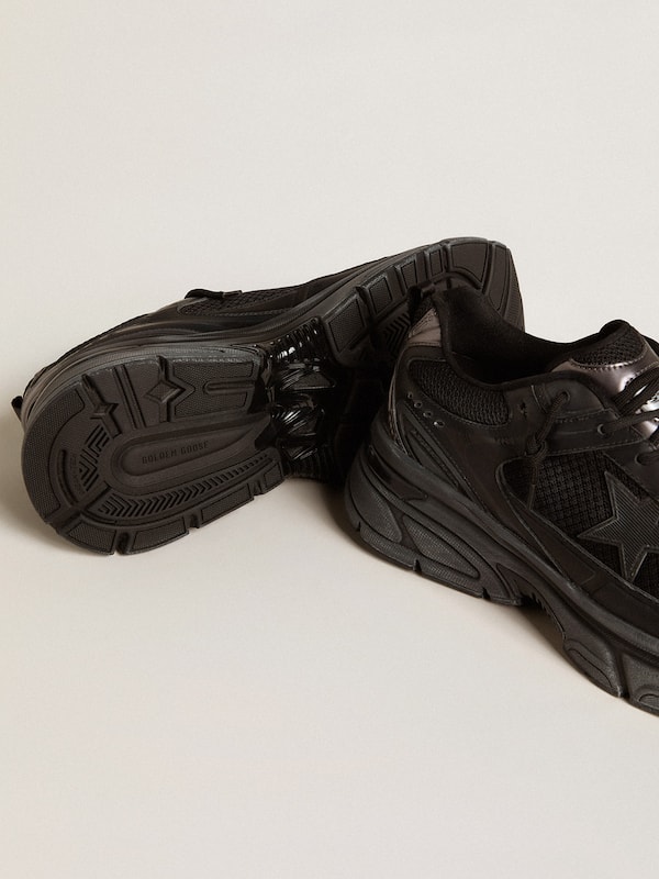 Golden Goose - Women’s Lightstar with black leather and mesh upper and black star in 