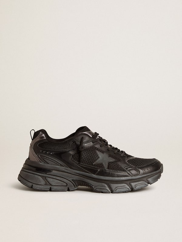 Golden Goose - Women’s Lightstar with black leather and mesh upper and black star in 
