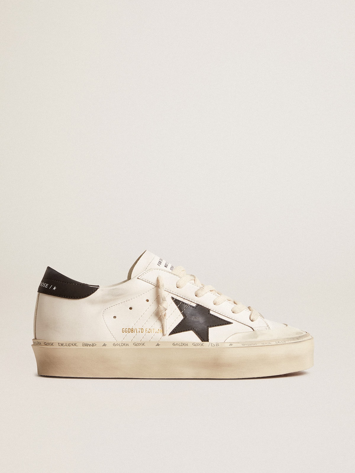 Golden Goose - Woman's white bio-based Hi Star LTD with black bio-based star and heel tab in 