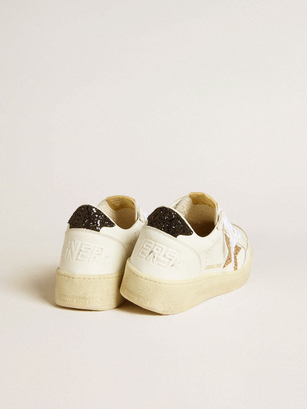 Golden Goose - Women’s Ball Star in white leather with gold glitter star and black glitter heel tab in 