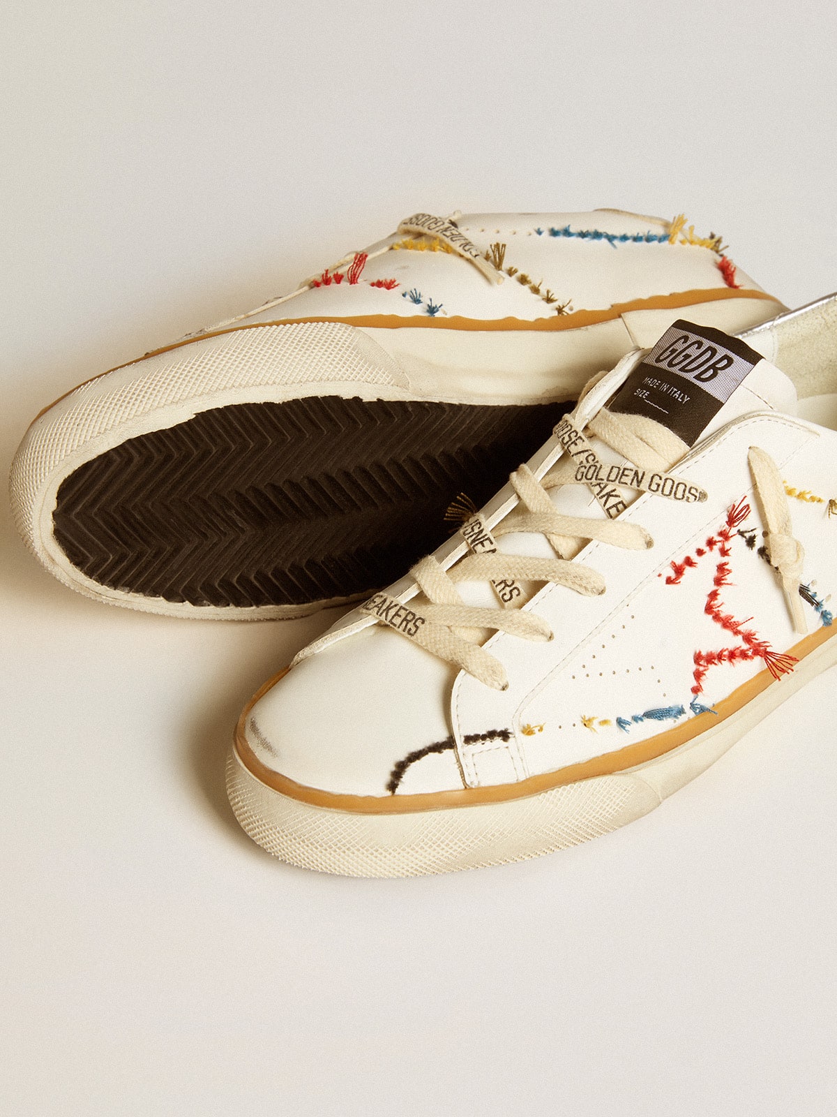 Golden Goose - Women’s Super-Star LTD with perforated star and metallic leather heel tab in 