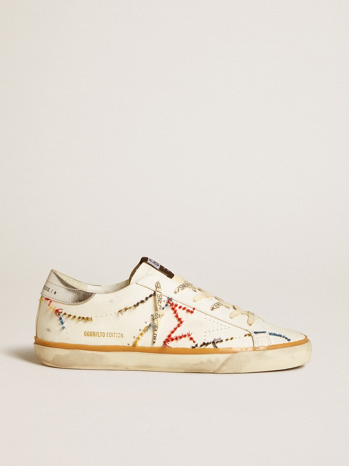 Golden Goose - Women’s Super-Star LTD with perforated star and metallic leather heel tab in 