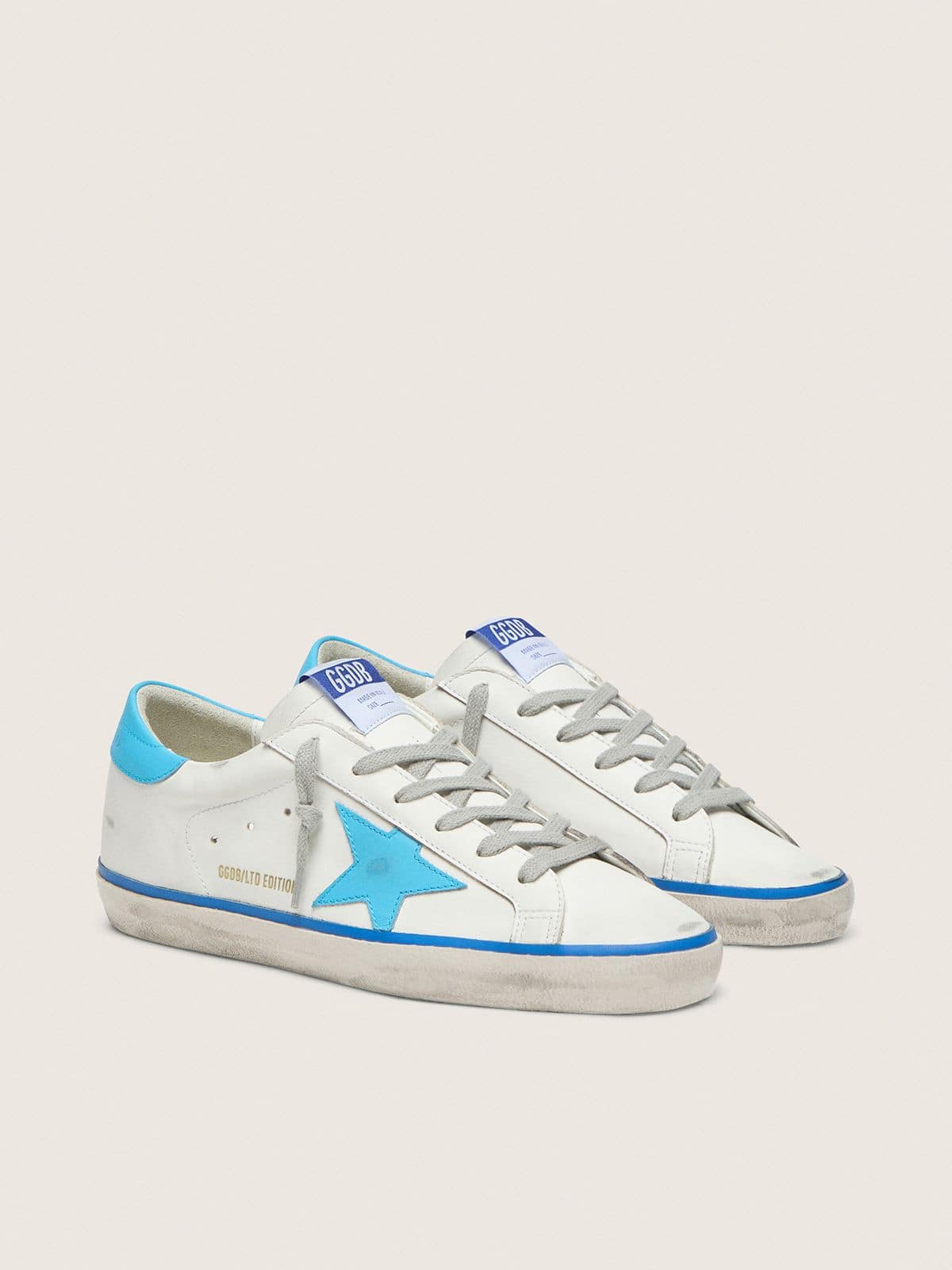 Golden Goose - Women's Super-Star LTD in white leather with light blue leather star and heel tab in 