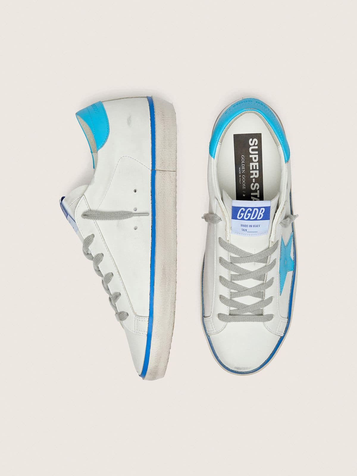 Golden Goose - Women's Super-Star LTD in white leather with light blue leather star and heel tab in 