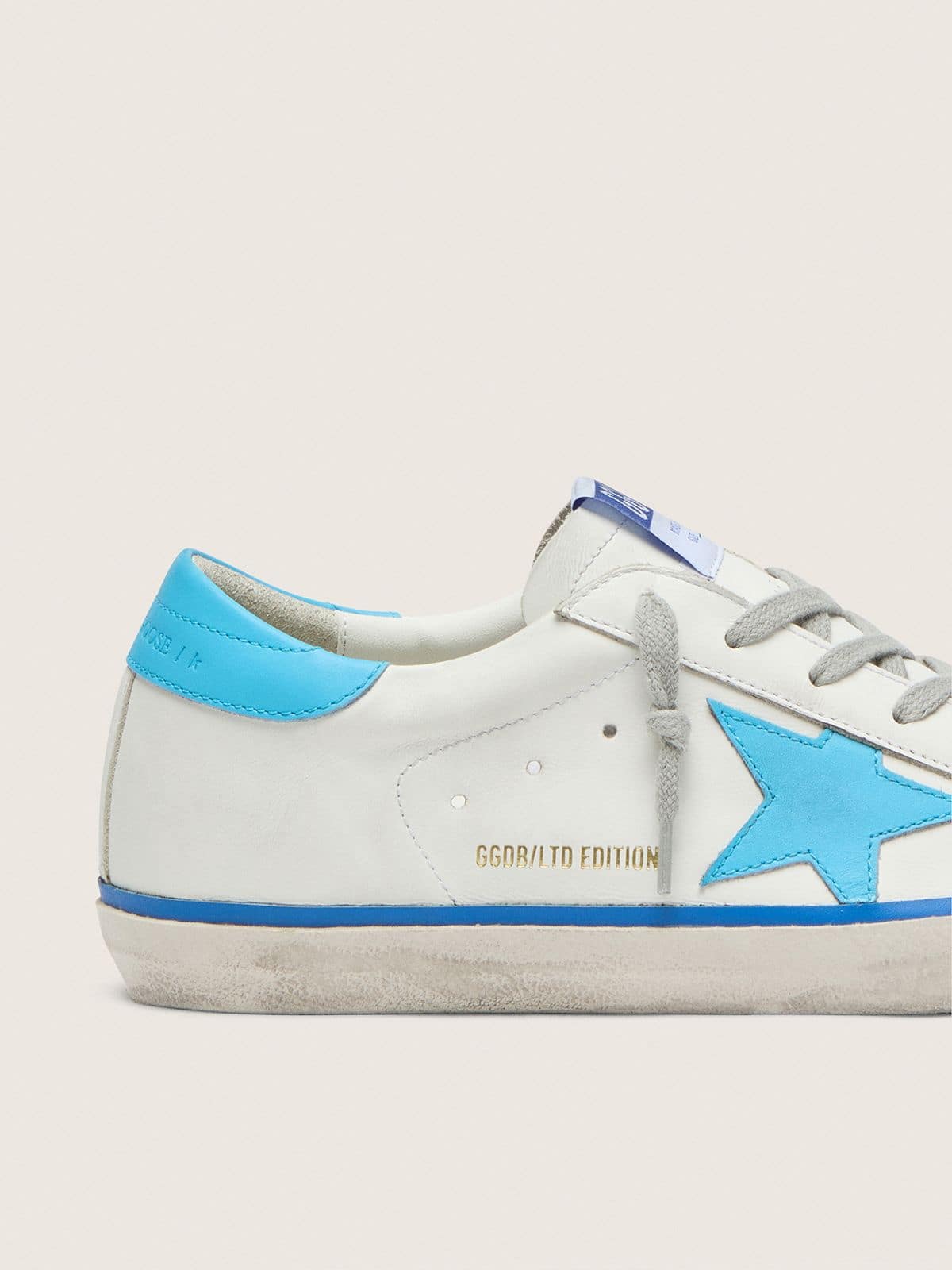 Golden Goose - Women's Super-Star LTD in white leather with light blue leather star and heel tab in 