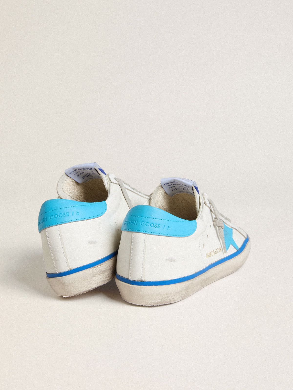 Golden Goose - Super-Star 限定版 レディース レザー（ホワイト） レザースター＆ヒールタブ（ライトブルー） in 