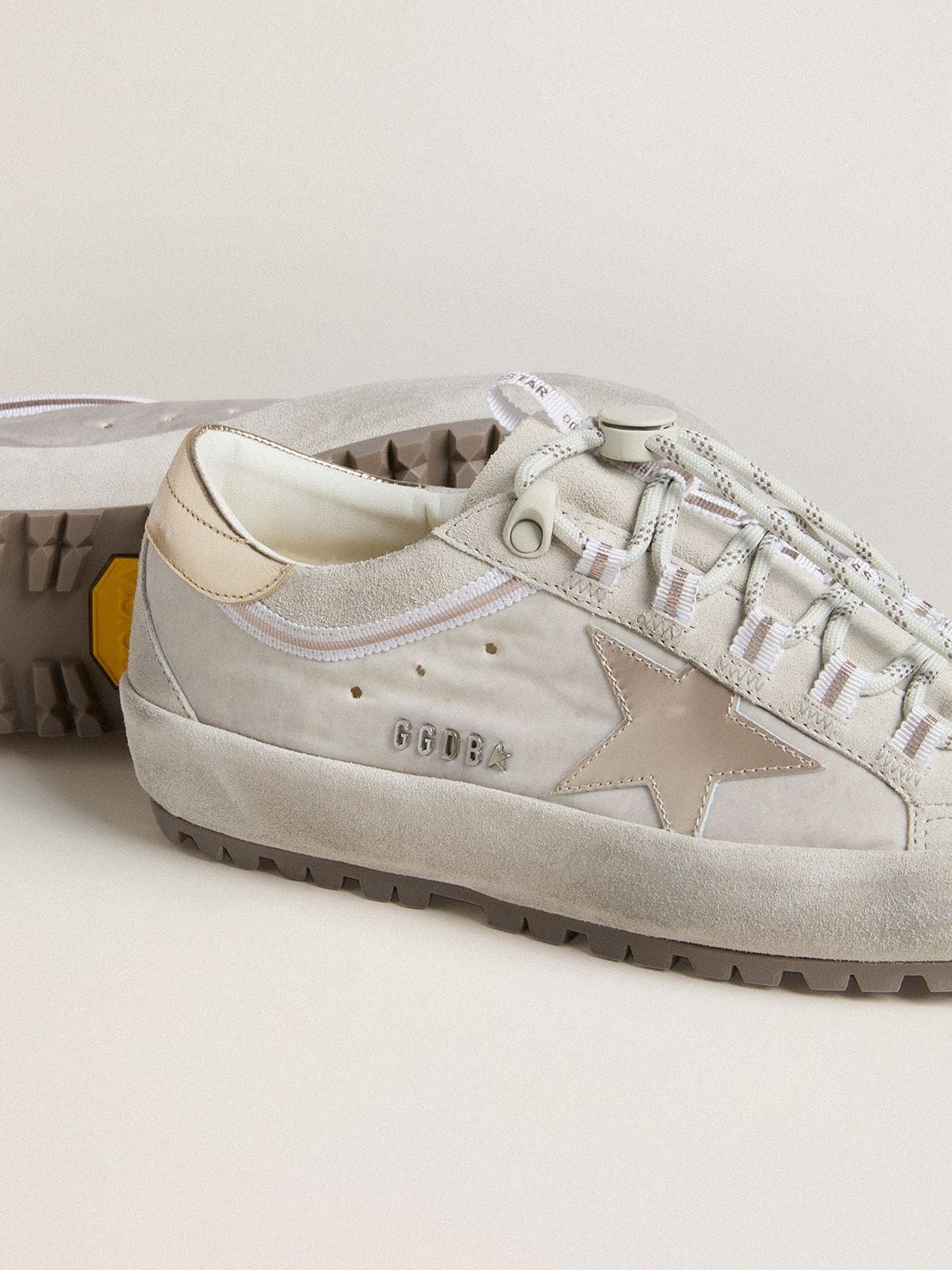 Super-Star Ski Donna in nylon grigio chiaro con stella e talloncino in pelle laminata