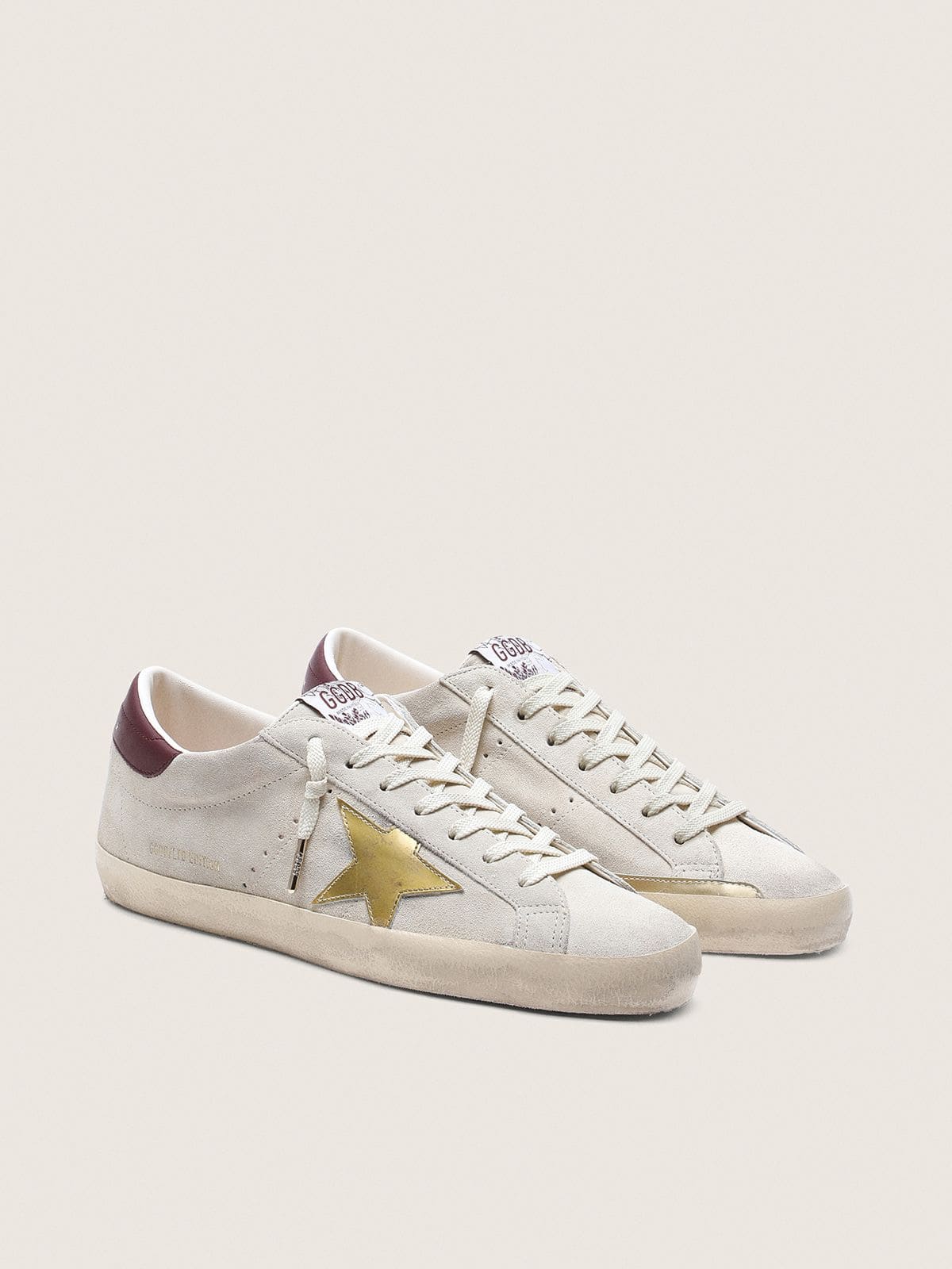 Golden Goose - Super-Star Feminino CNY de suede marfim com estrela de couro met&aacute;lico e tal&atilde;o de couro in 