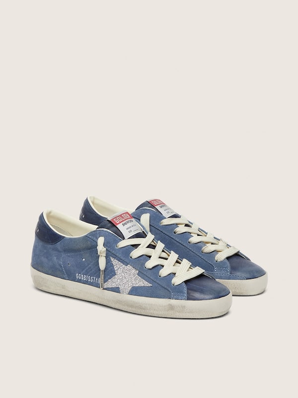 Women&rsquo;s Super-Star in denim-blue suede with silver glitter star