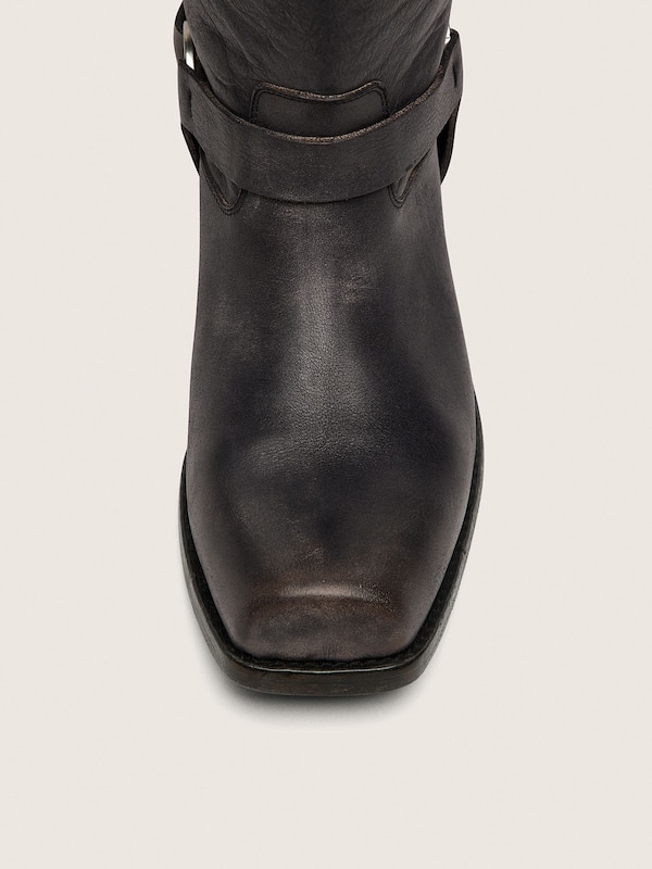 Golden Goose - Women's high Biker boots in black leather with strap and silver-colored buckle in 