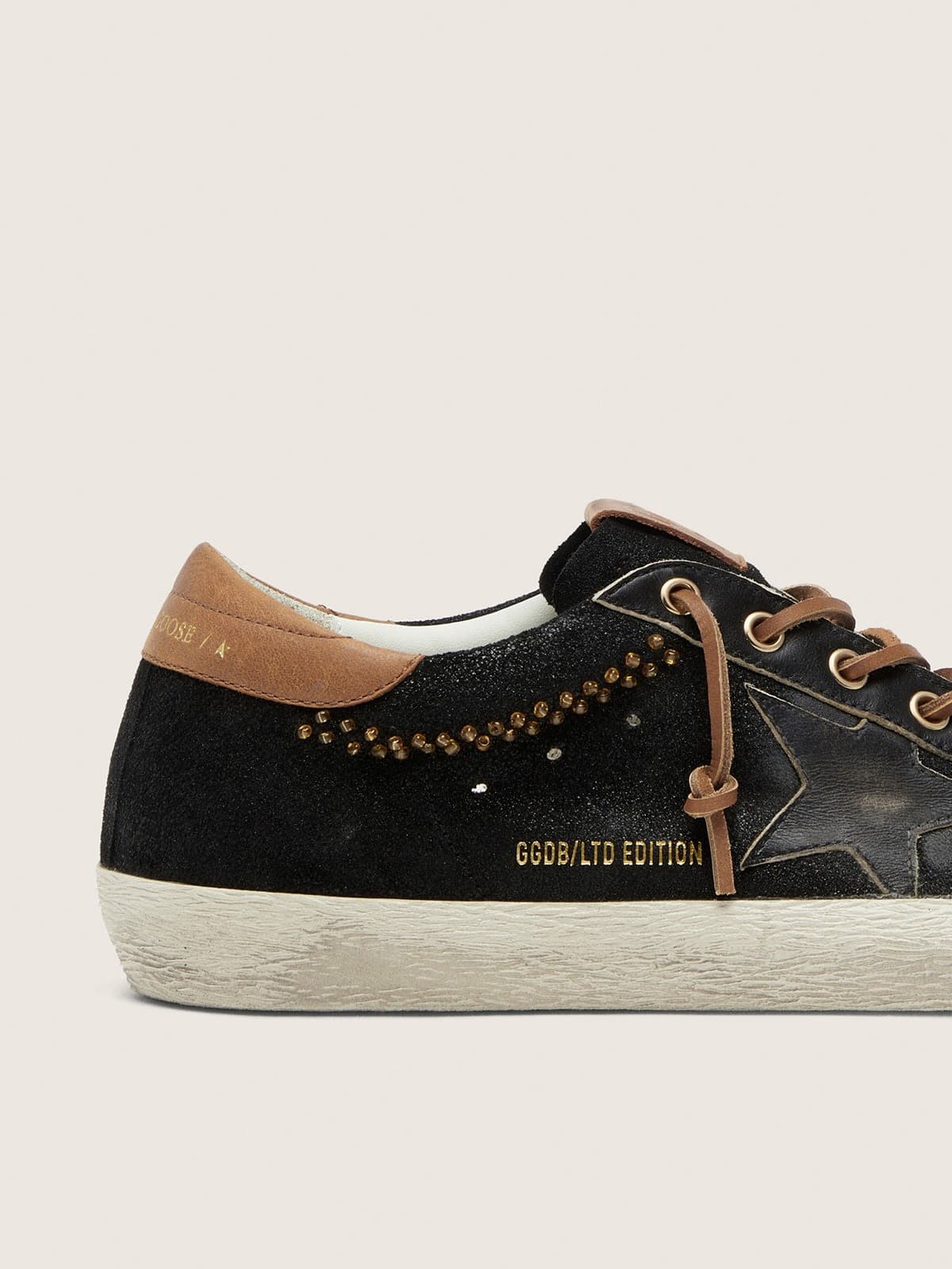 Golden Goose - Super-Star LTD Damen aus Leder mit schwarzem Glitzer und schwarzem Lederstern in 