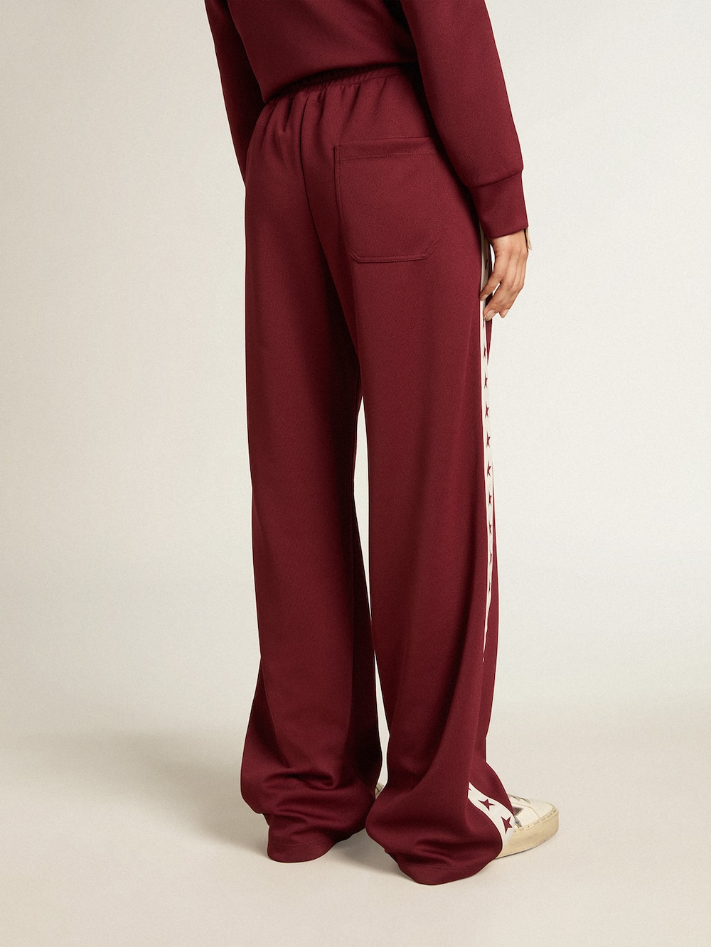 Golden Goose - Women’s burgundy joggers with stars on the sides in 