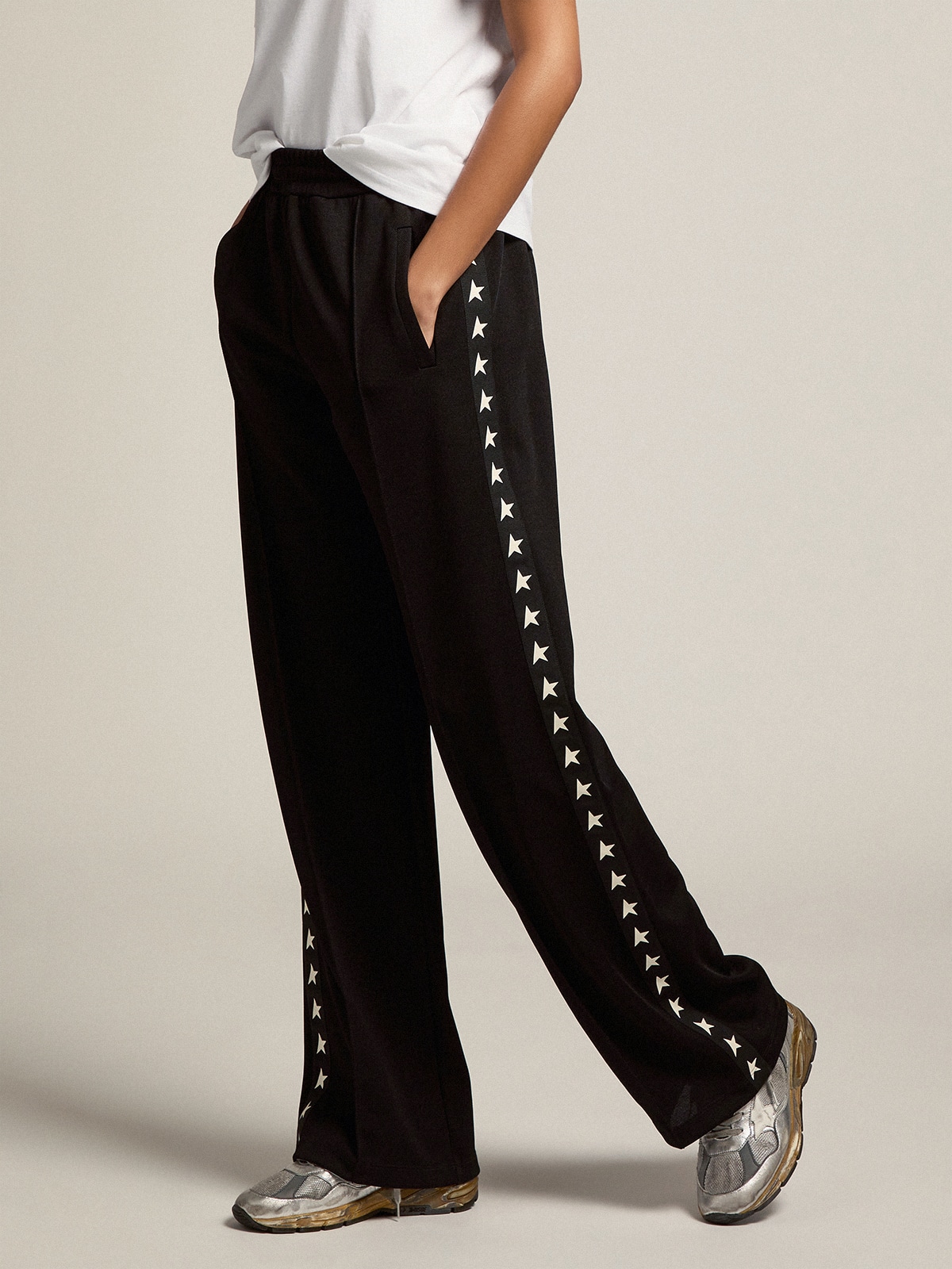 Joggers with stars on the side on sale