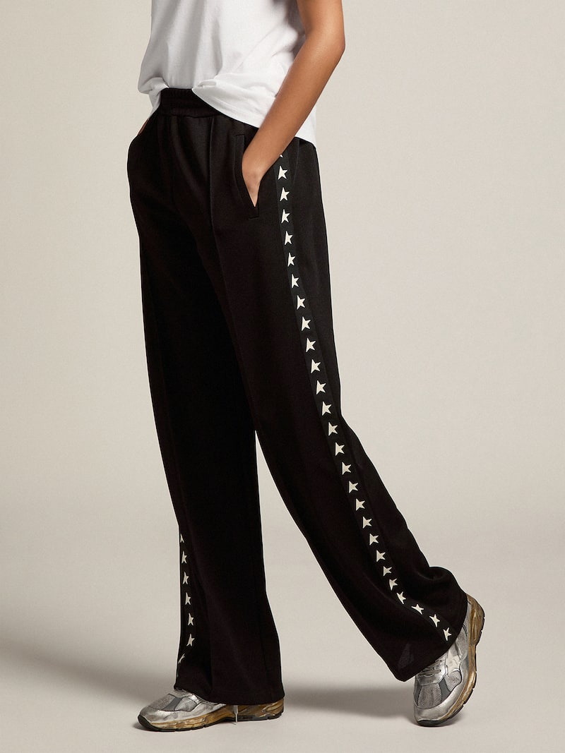 Golden Goose - Pantalon de jogging noir pour femme avec &eacute;toiles blanches sur les c&ocirc;t&eacute;s in 