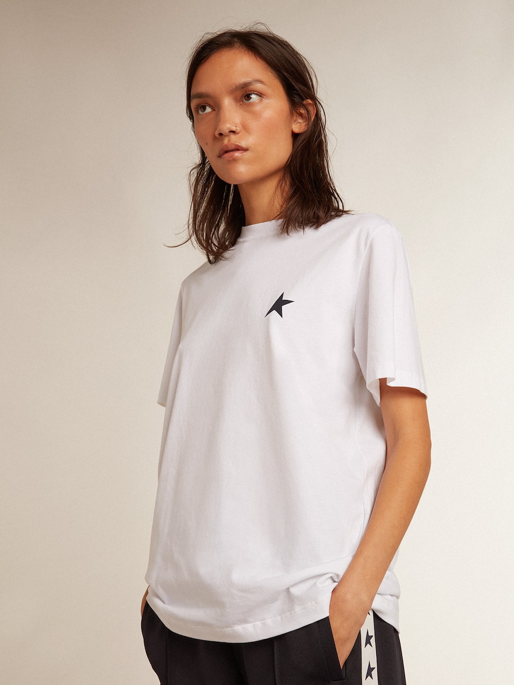 Golden Goose - Women’s white T-shirt with dark blue star on the front in 
