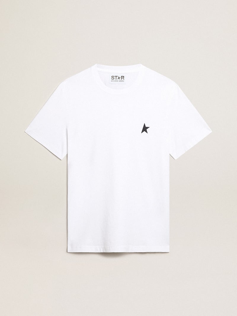 Camiseta blanca de mujer con estrella azul oscuro en el delantero