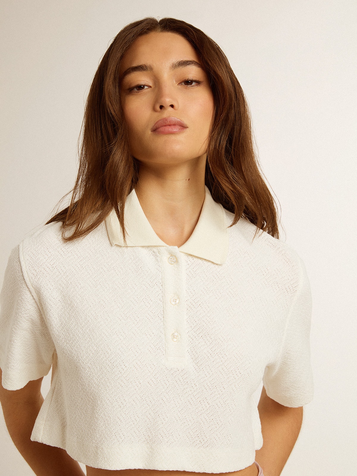 White cotton cropped polo shirt with mother-of-pearl buttons