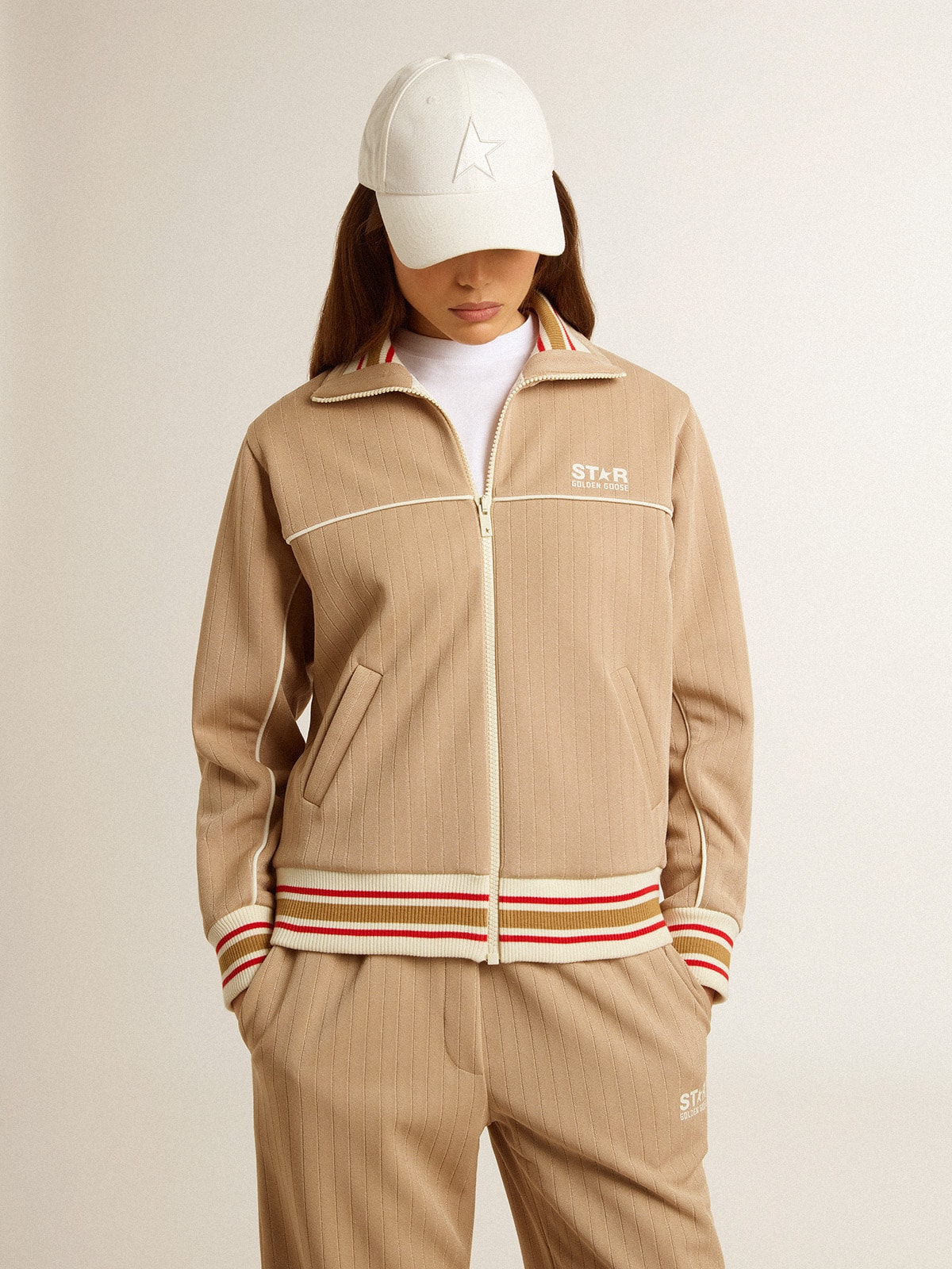 Women’s light beige zipped sweatshirt with white logo