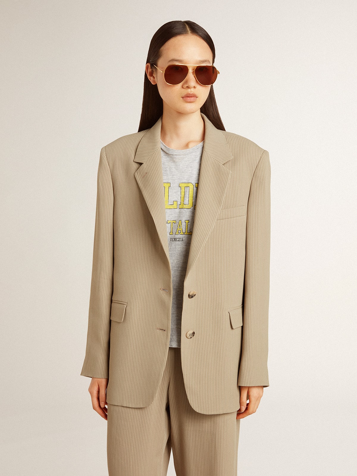 Women's beige pinstripe single-breasted jacket with an oversized fit