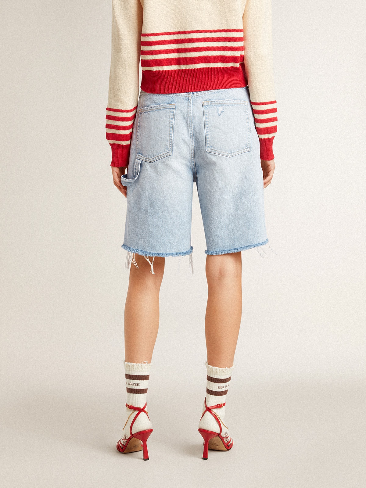 Golden Goose - Women's Bermuda shorts in lived-in effect denim in 