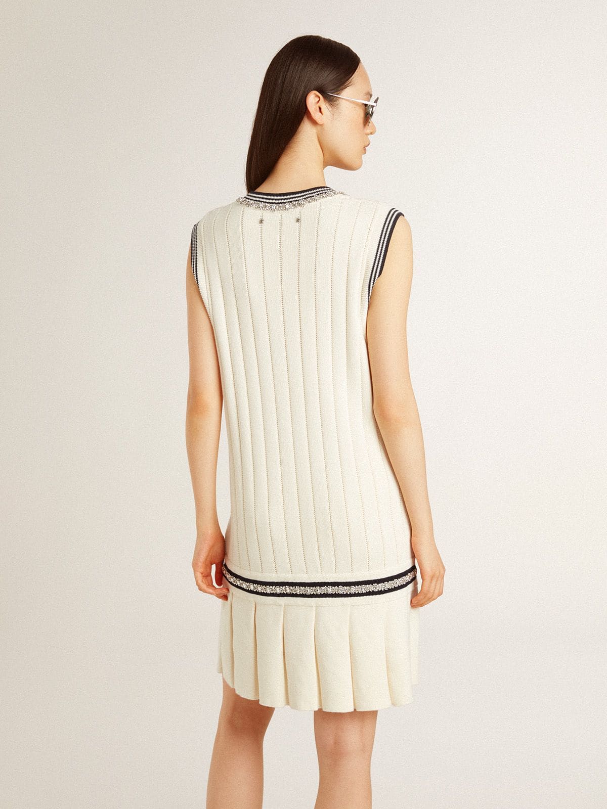Women's worn-white cotton vest dress with dark blue ribbing