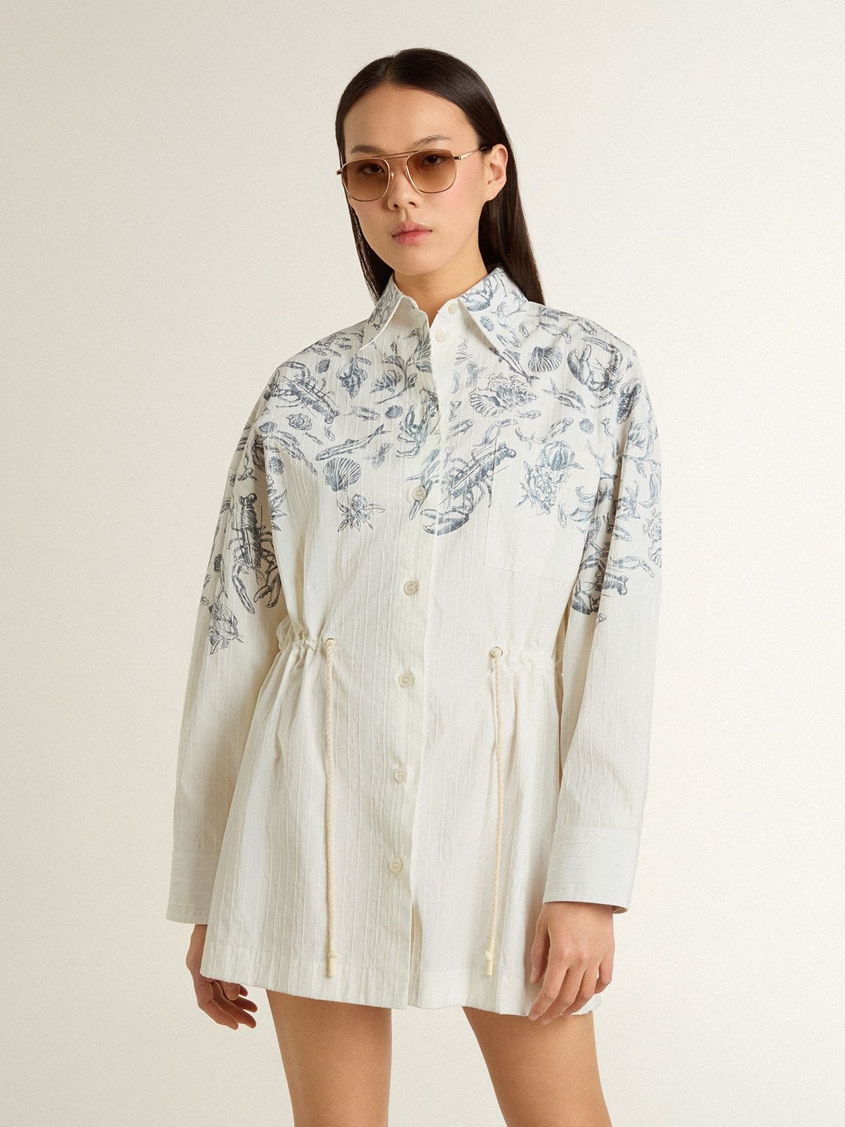 Women's short shirt dress in white striped cotton with a