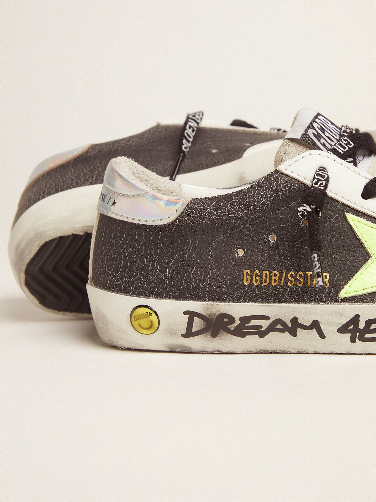 Golden Goose - Super-Star sneakers in crackle leather with a fluorescent yellow star in 