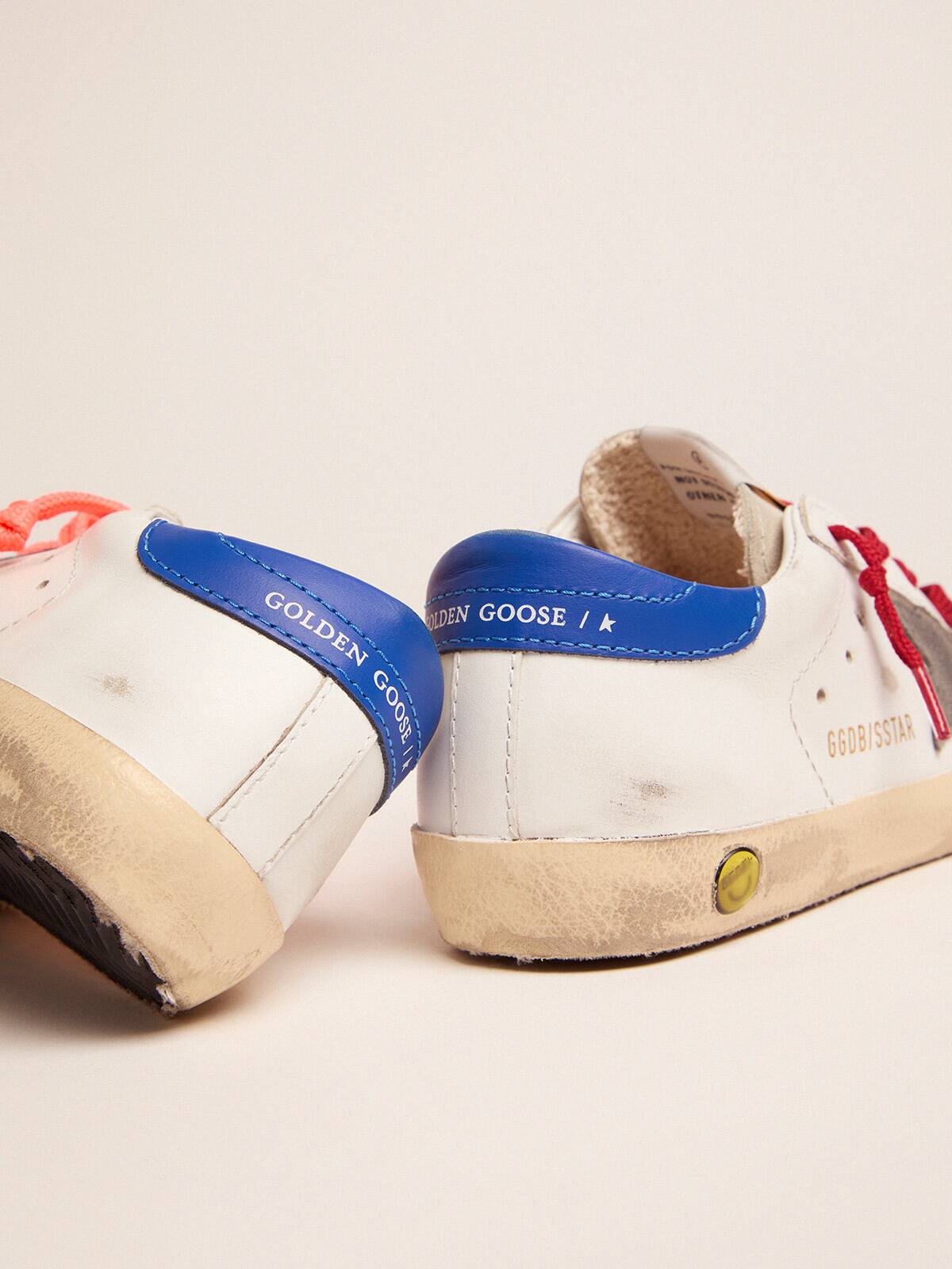 Young Super-Star sneakers with blue heel tab and red laces