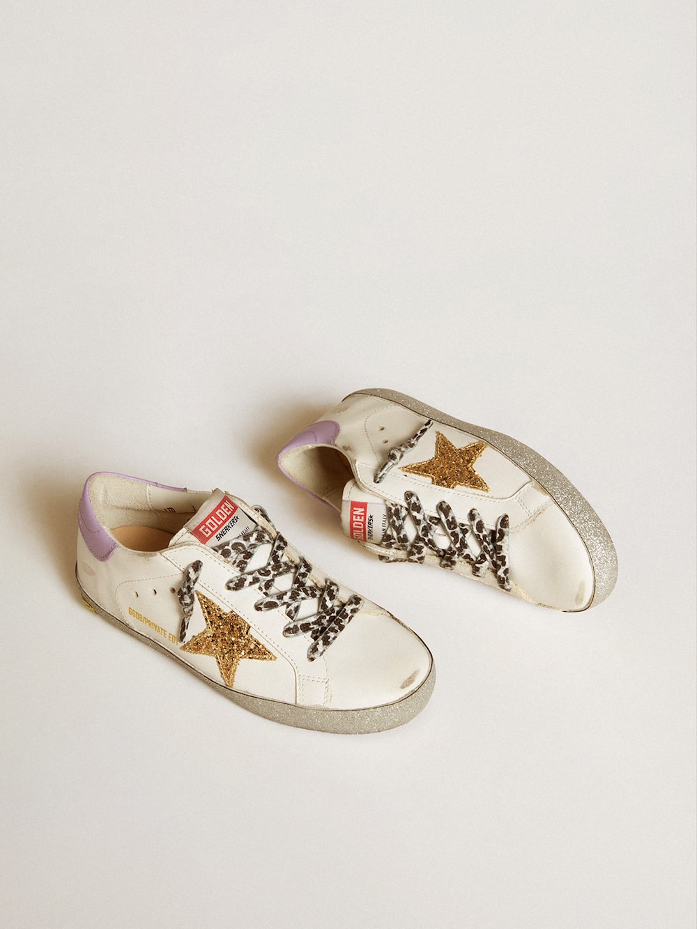 Golden Goose - Super-Star LTD with gold glitter star and purple leather heel tab in 