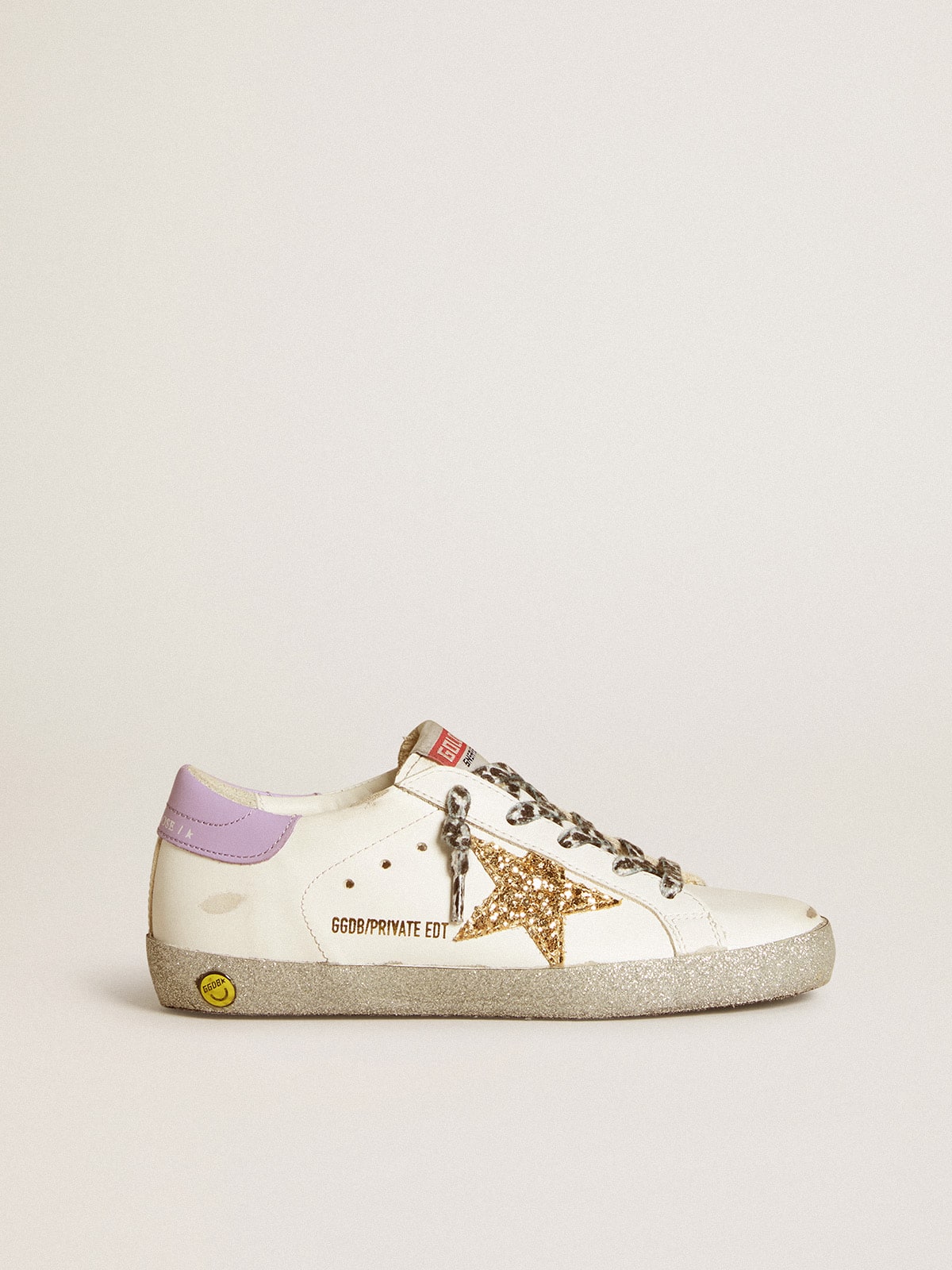 Super-Star LTD with gold glitter star and purple leather heel tab