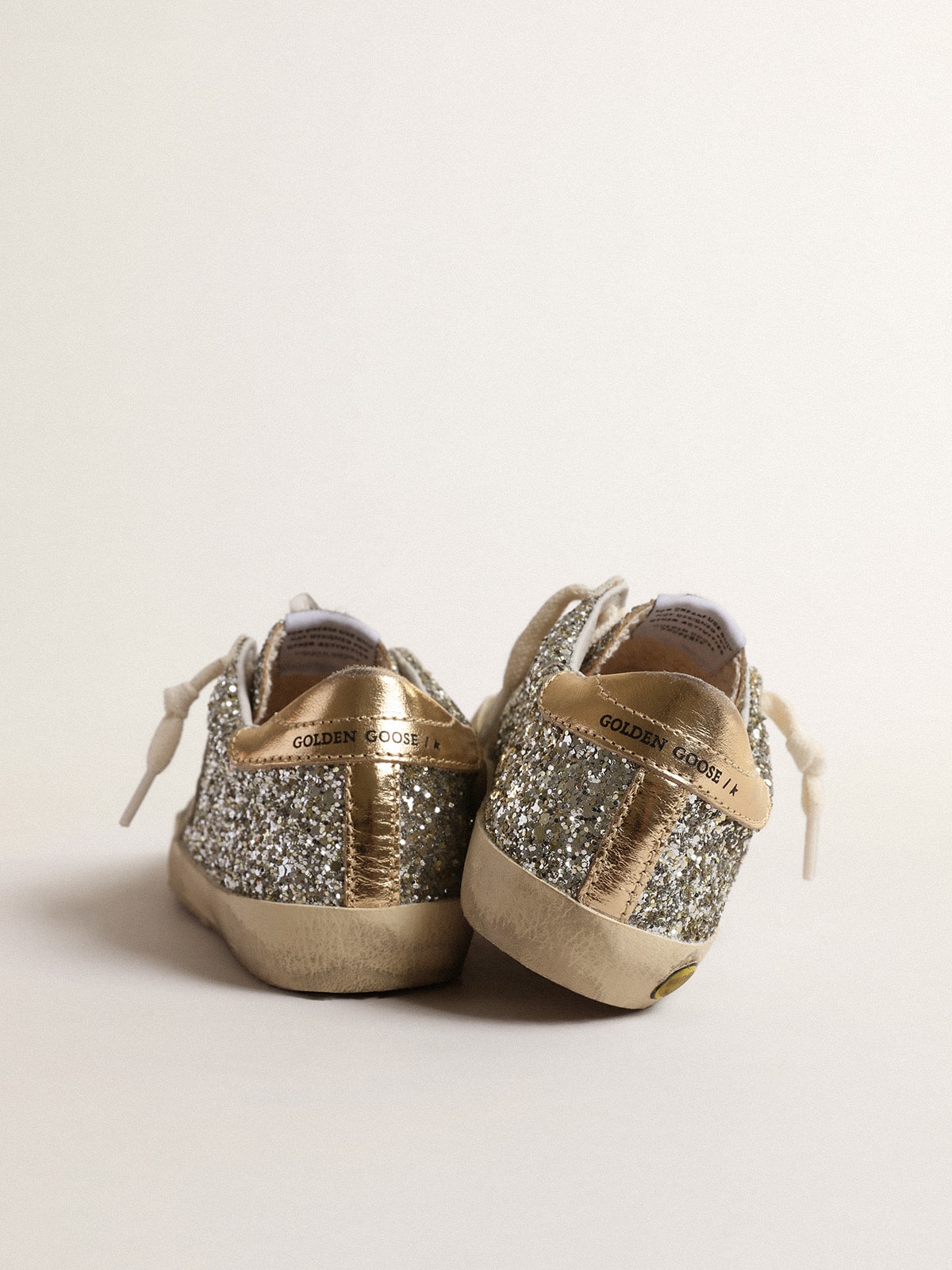 Golden Goose - Super-Star Young in glitter with a suede star and gold heel tab in 