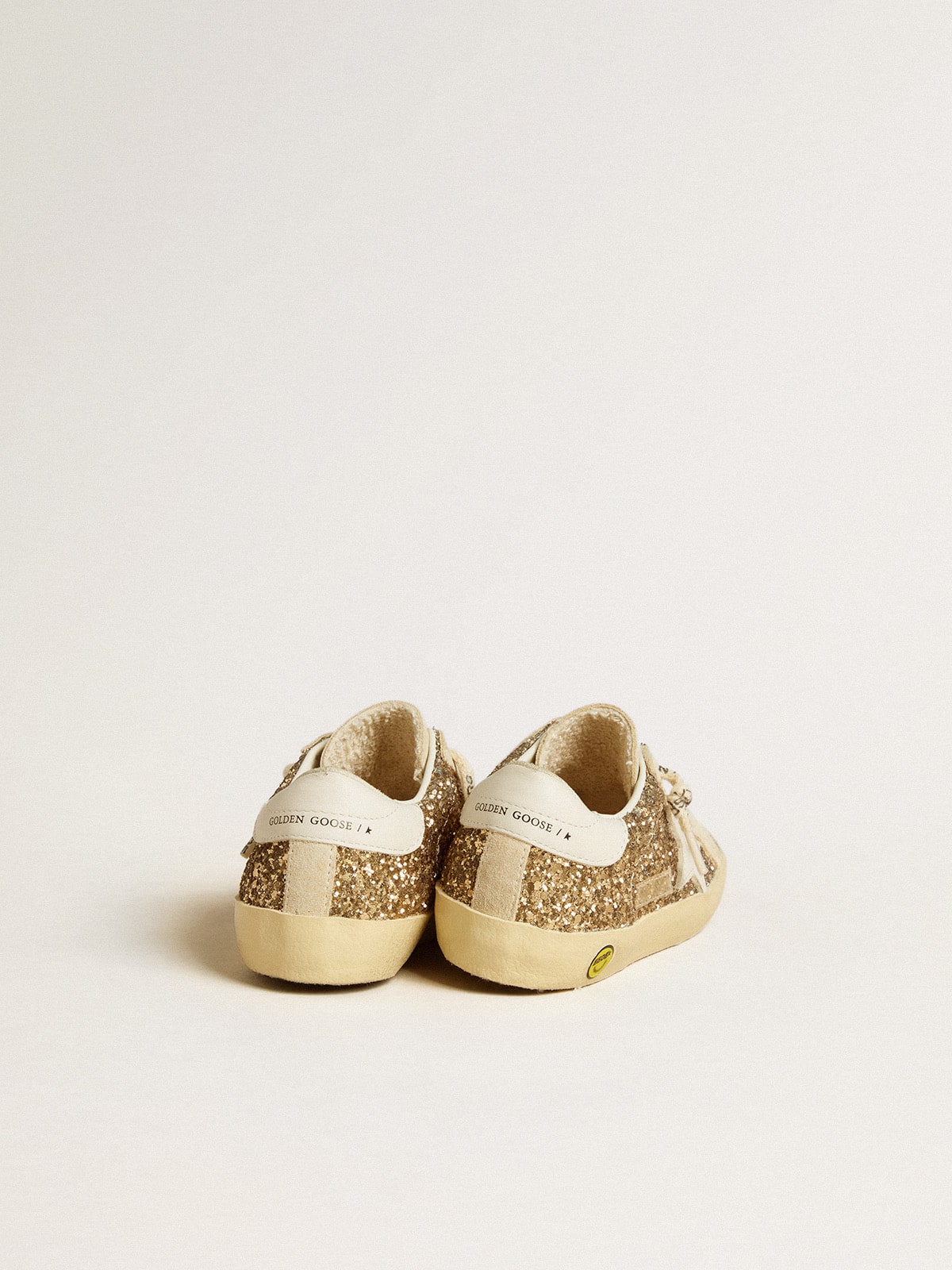 Golden Goose - Super-Star Young in gold glitter with white leather star and heel tab in 