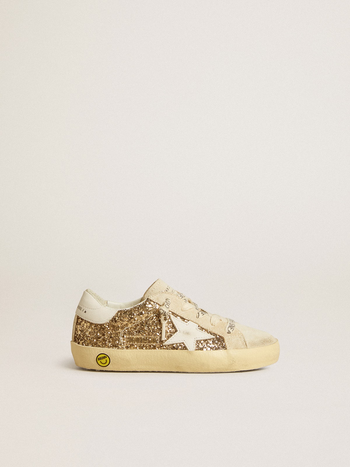 Golden Goose - Super-Star Young in gold glitter with white leather star and heel tab in 