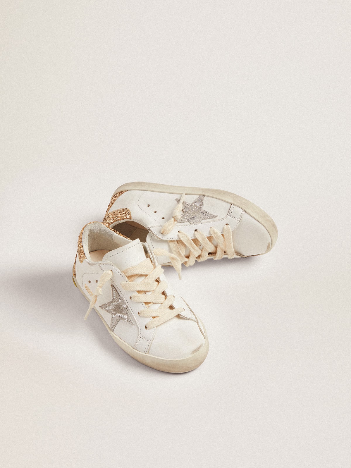 Golden Goose - Super-Star sneakers with snake-print silver metallic leather star and gold glitter heel tab in 