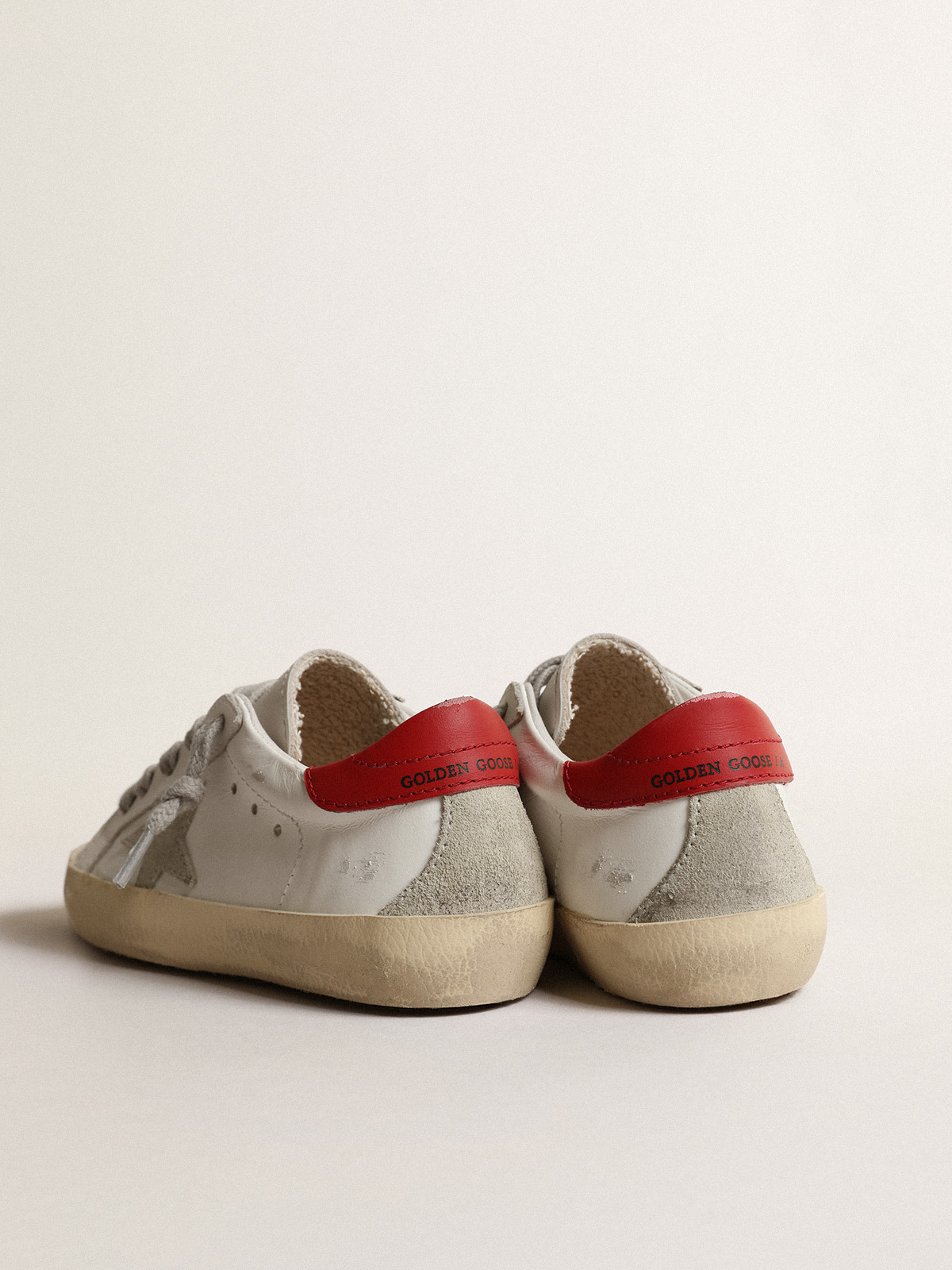 Golden Goose - Super-Star Young with suede star and red leather heel tab in