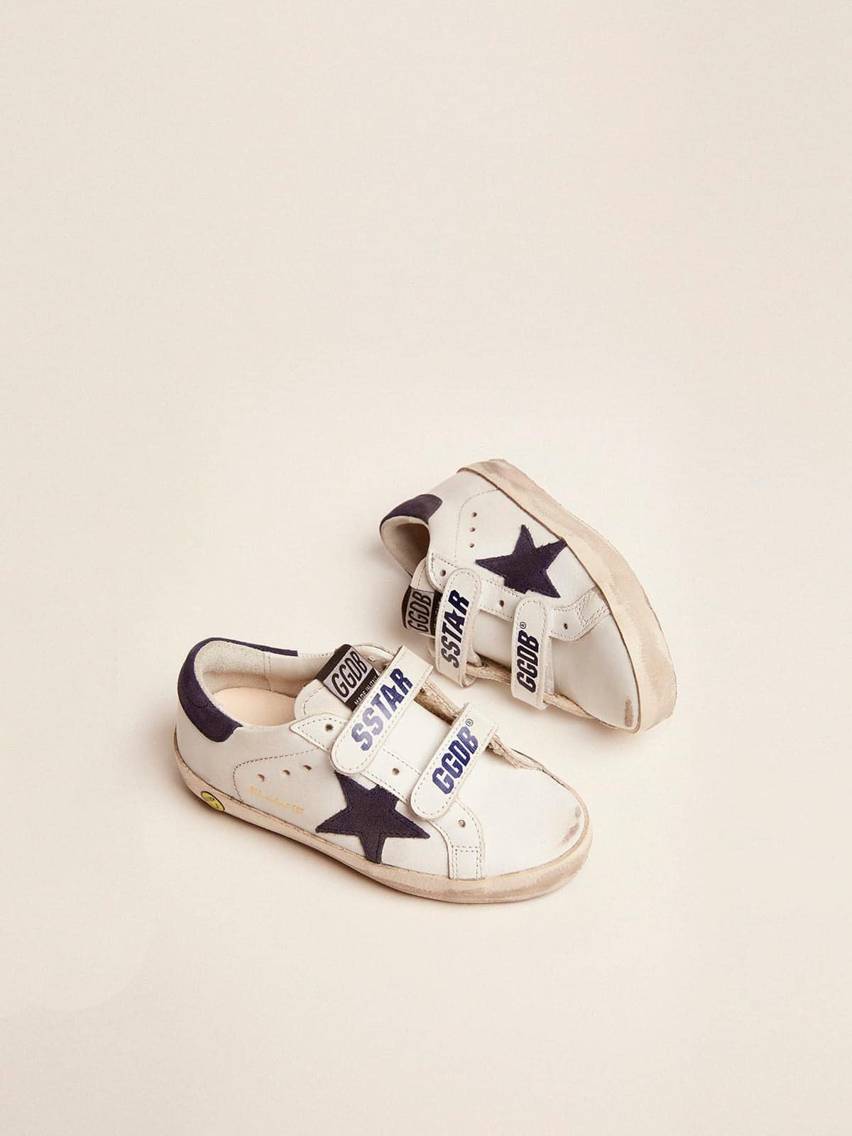 Golden Goose - Old School Young de couro branco com estrela e talão de suede azul in 