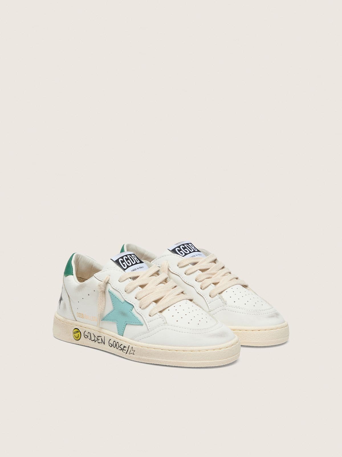 Young Ball Star in white leather with aqua-green leather star