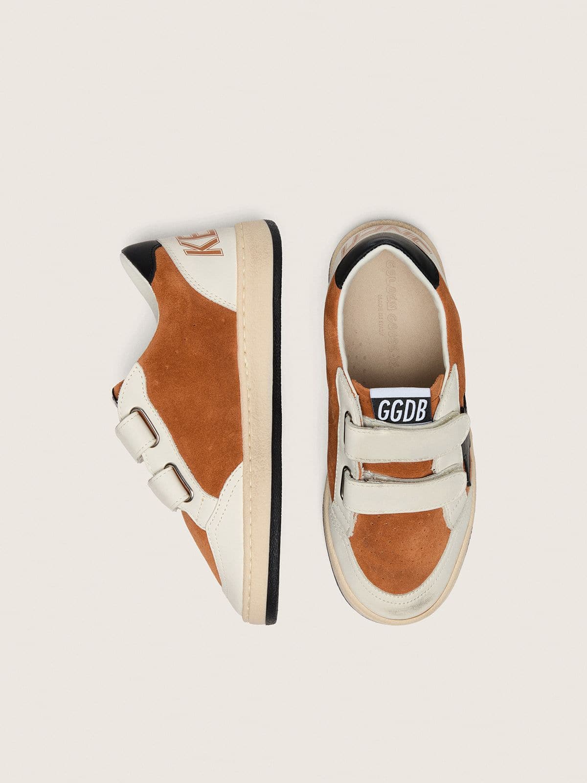 Young Ball Star in brick-red suede and cream leather with black leather star