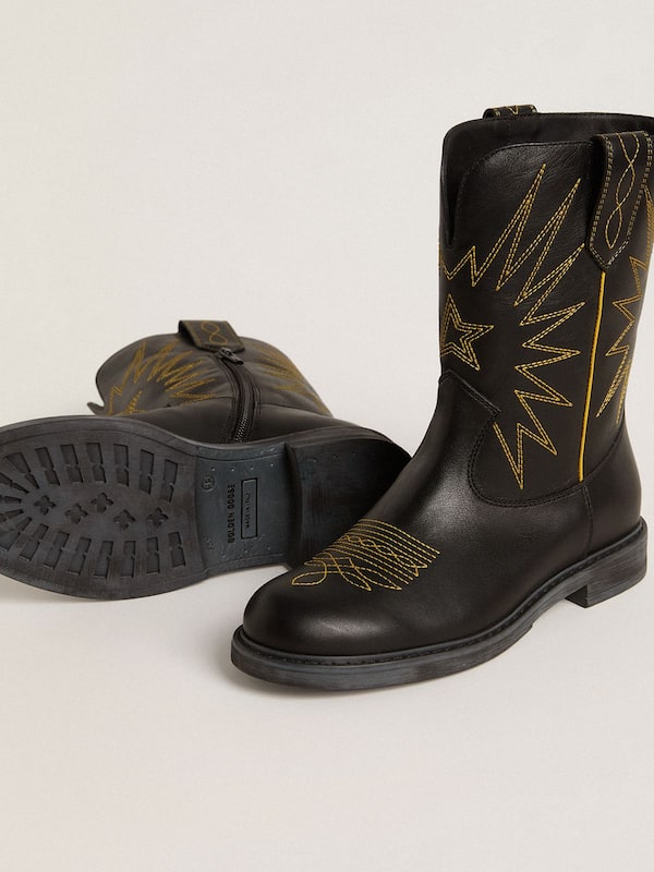 Golden Goose - Wish Young boots in black leather with yellow star embroidery in 