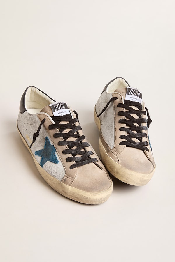Golden Goose - Men&rsquo;s Super-Star with light blue canvas star and black leather heel tab in 