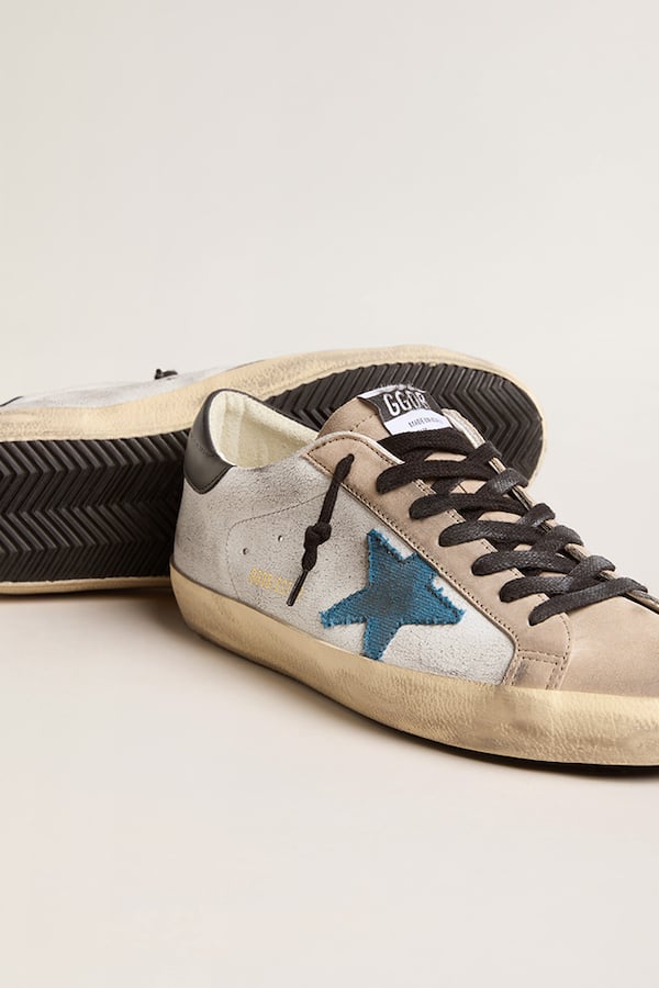 Golden Goose - Men&rsquo;s Super-Star with light blue canvas star and black leather heel tab in 